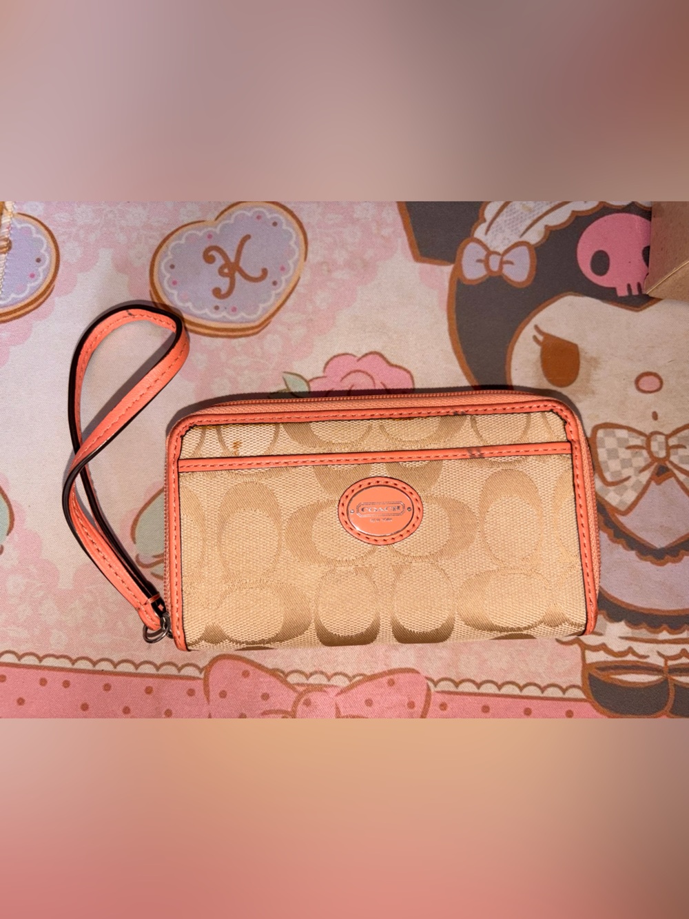 Coach Peach Signature Monogram Wristlet